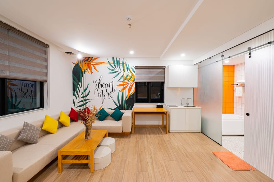 Deluxe Apartment, City View | Living room | 55-inch LCD TV with digital channels, TV