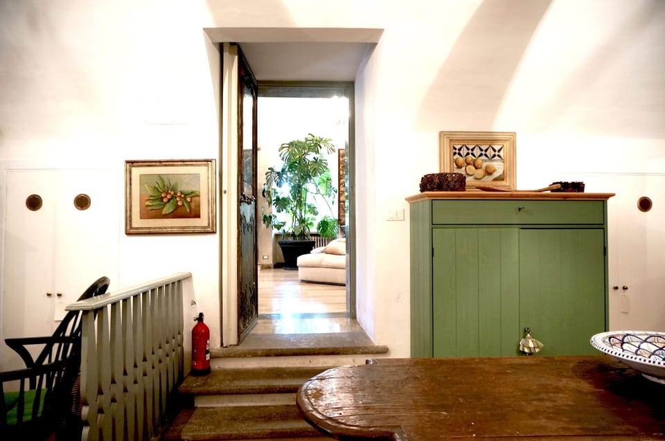 Door from large downstairs kitchen to the sitting room