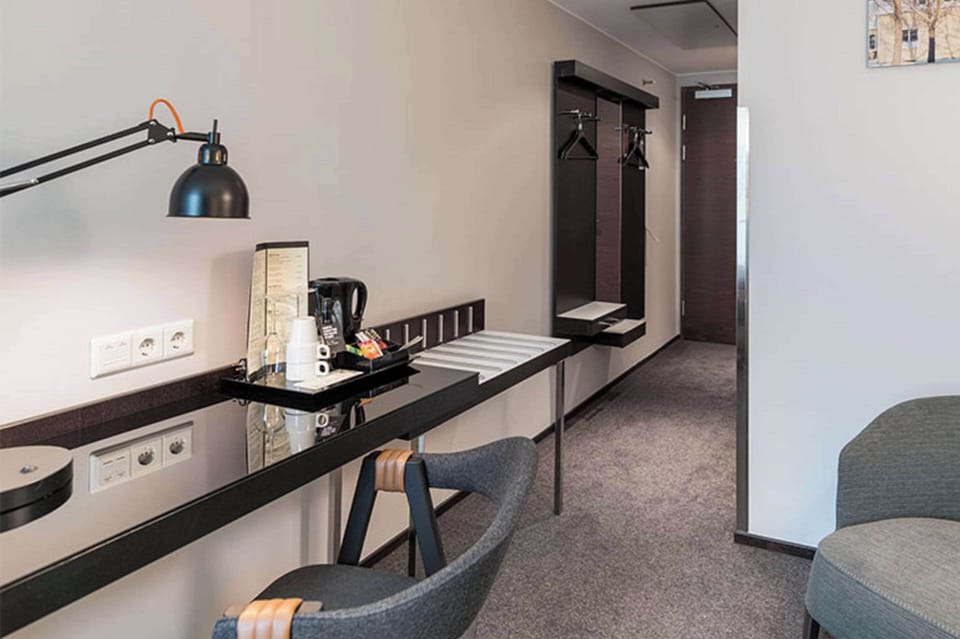 Compact Double Room | Minibar, desk, laptop workspace, iron/ironing board