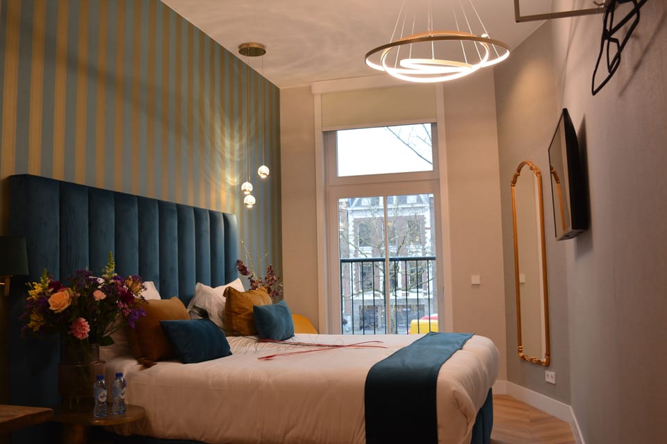 Twin Room Canal View | Egyptian cotton sheets, premium bedding, memory foam beds, free WiFi