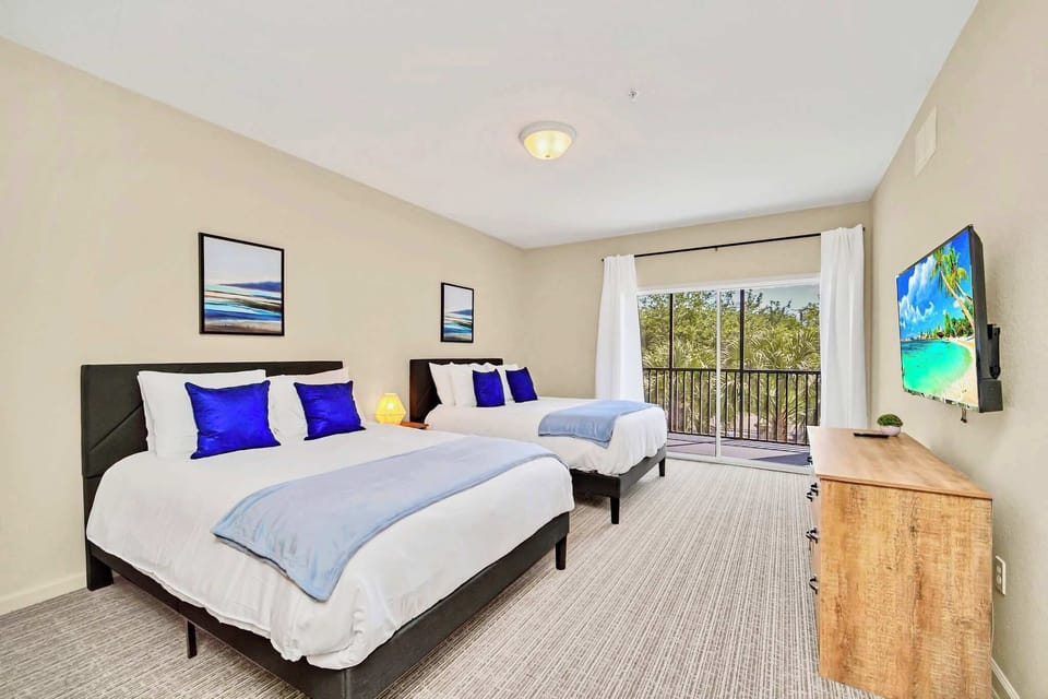 Twin queen bedroom suite with smart TV
