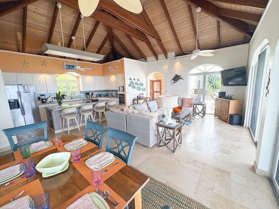 Looking towards the living room and kitchen from the dining area