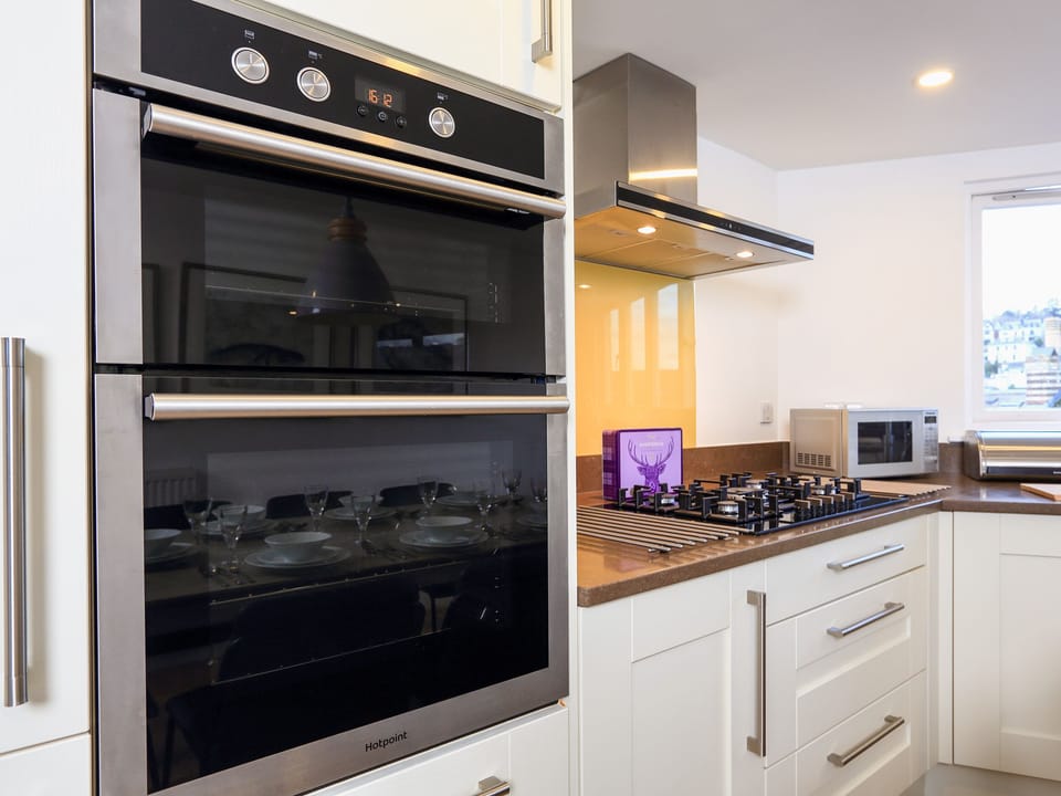 Fridge, dishwasher, electric kettle, cookware/dishes/utensils