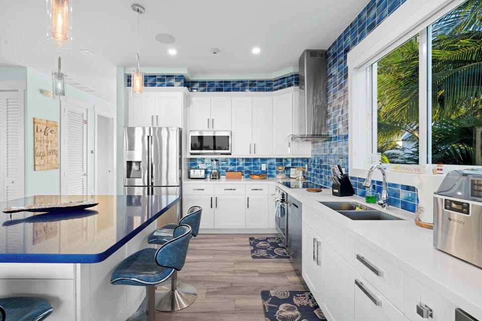 With spacious countertops and sleek cabinetry, it's a delightful space to whip up your favorite meals. Come create unforgettable memories here!