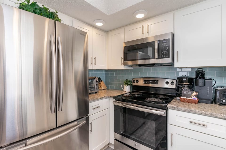 Condo, 2 Bedrooms | Private kitchen | Coffee/tea maker, fridge, oven, toaster