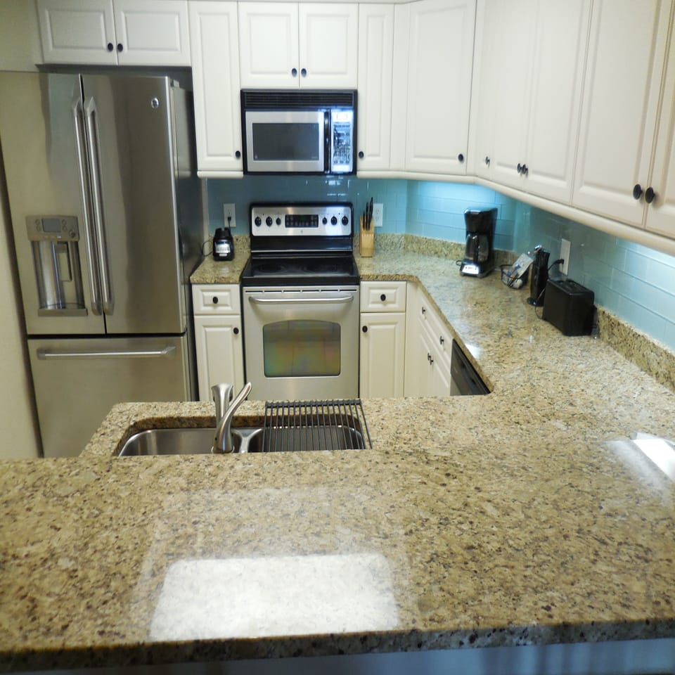 Condo, 2 Bedrooms | Private kitchen | Coffee/tea maker, fridge, oven, toaster