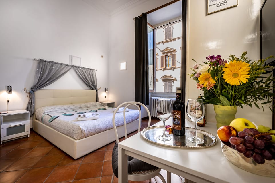 Deluxe Room | Premium bedding, in-room safe, blackout drapes, iron/ironing board