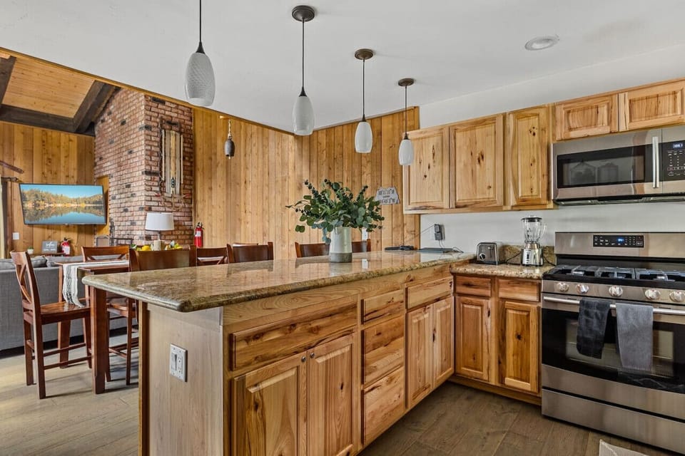 The kitchen features a Keurig and Breville Barista Touch Pro.