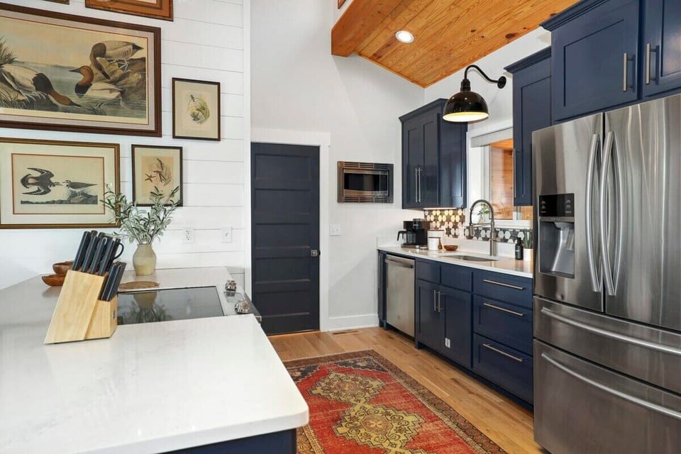 Directly to the right, you'll see our kitchen.