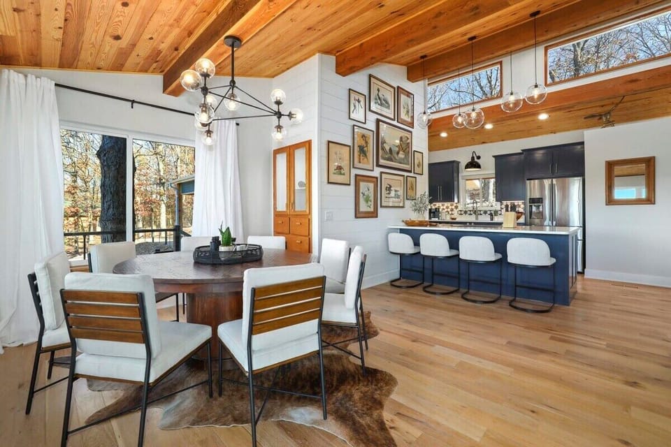 This is entire space is flooded with natural light and boasts gorgeous views of Beaver Lake from every angle.
