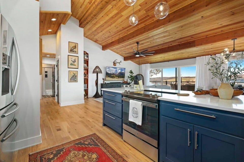 You'll also notice our STUNNING wooden vaulted ceilings and floor-to-ceiling windows.