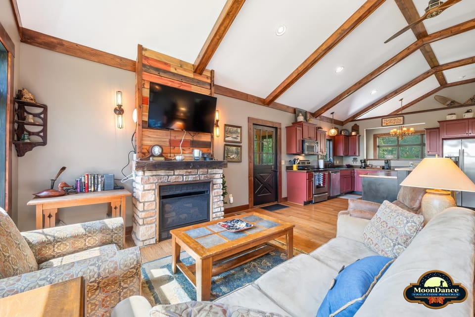 Spacious and elegant great room cozy up to the fire.