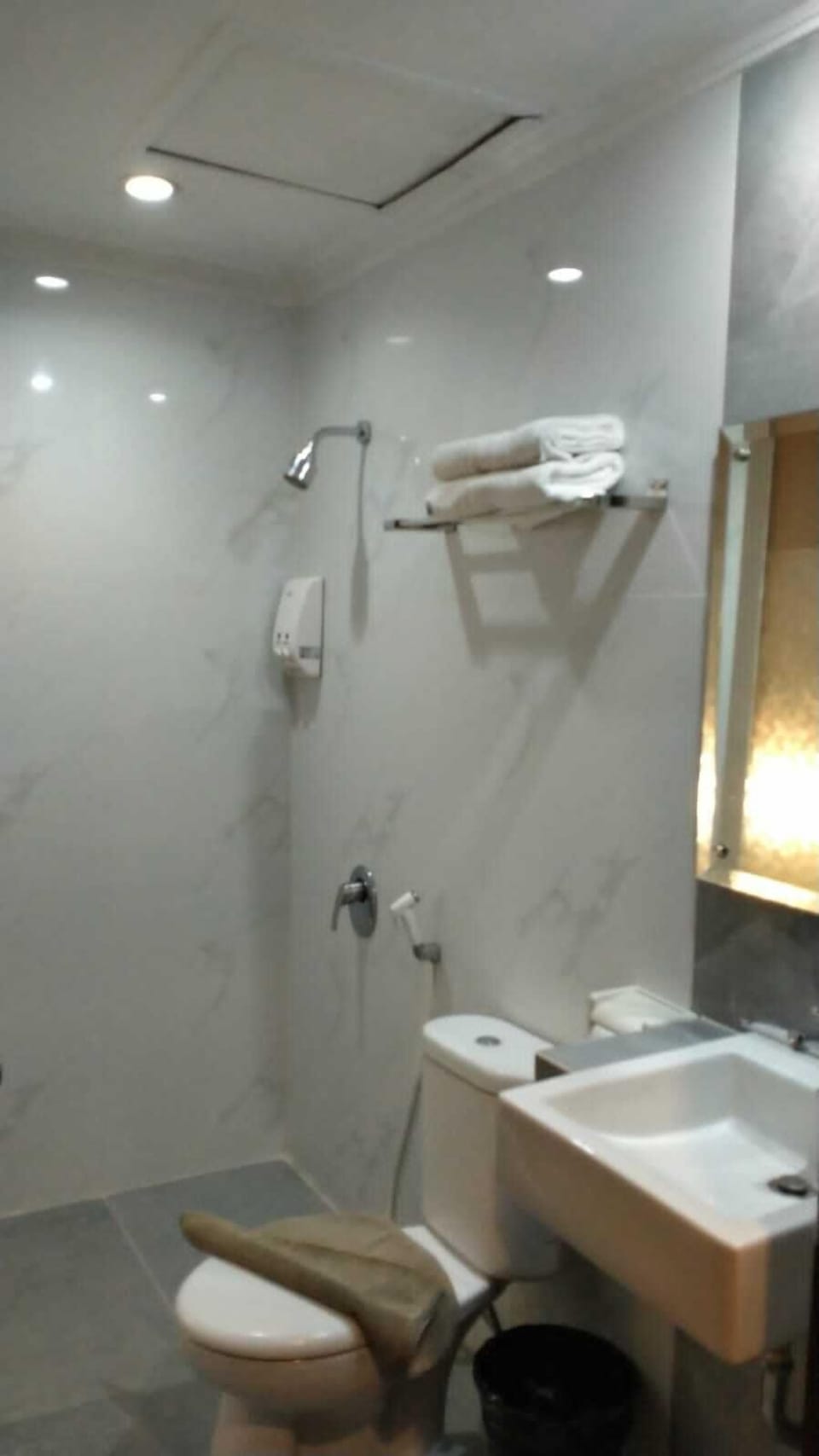 Shower, free toiletries, hair dryer, slippers