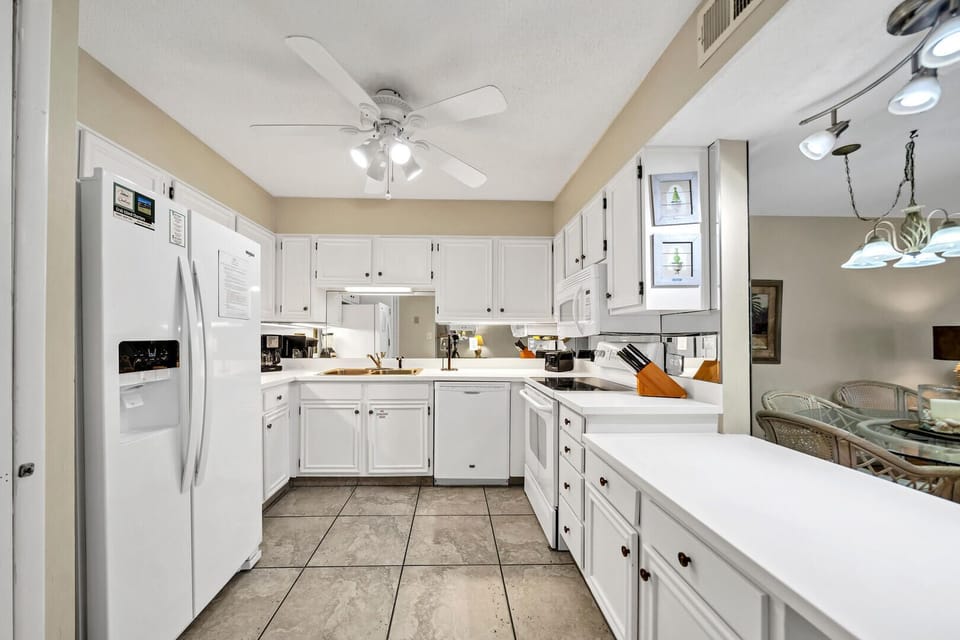 Well Equipped Kitchen For Cooking Has Both Coffee Maker and Single Coffee Pod Maker