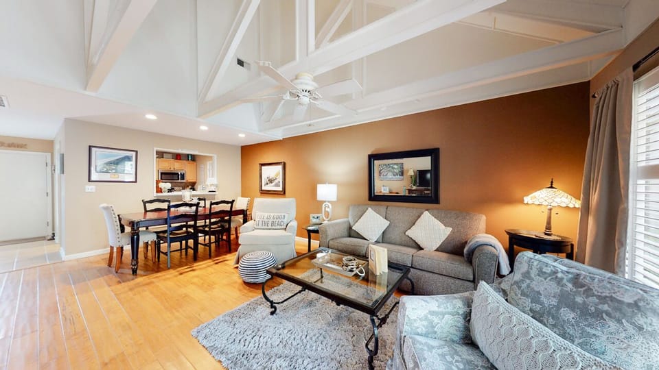 It's ideal for relaxing evenings, movie nights, or enjoying the indoor-outdoor Lowcountry lifestyle.