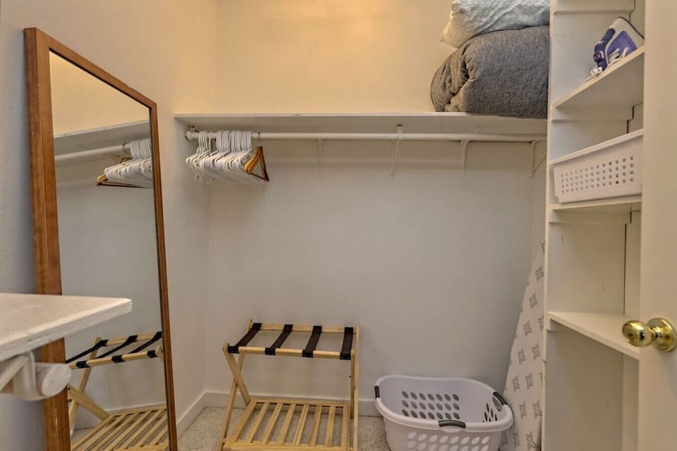Owner’s bedroom walk-in closet provides plenty of space for a few days or a few weeks.