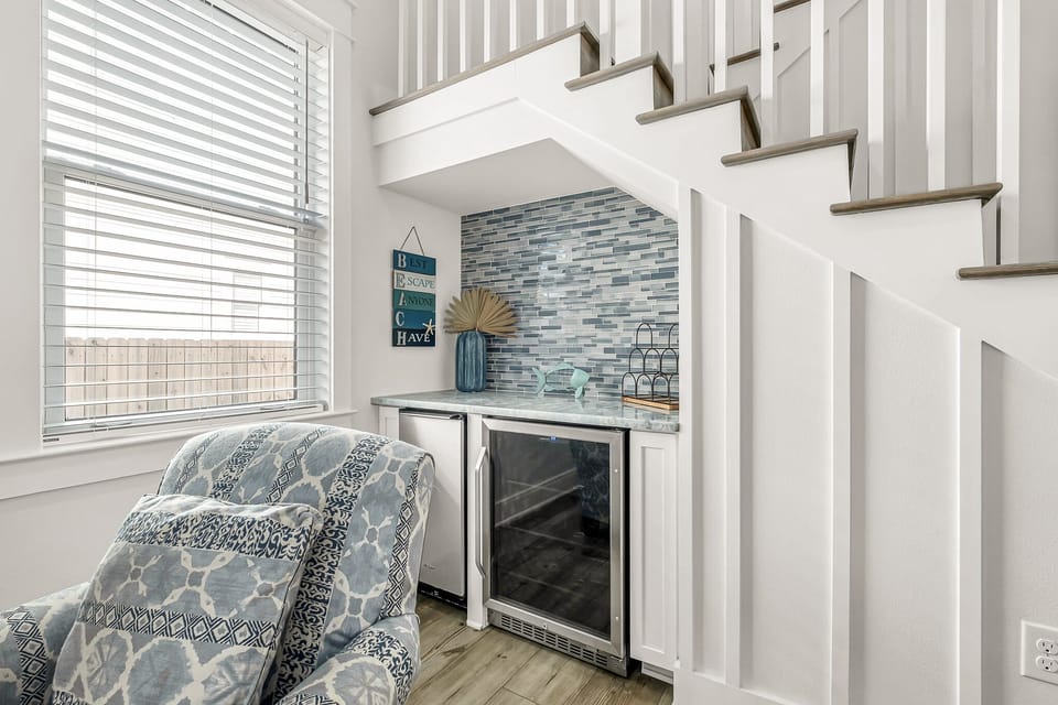 Beverage station under the stairs.