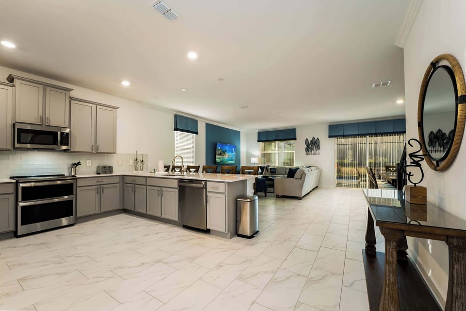 Spacious open-plan kitchen and living area perfect for entertaining and relaxation.