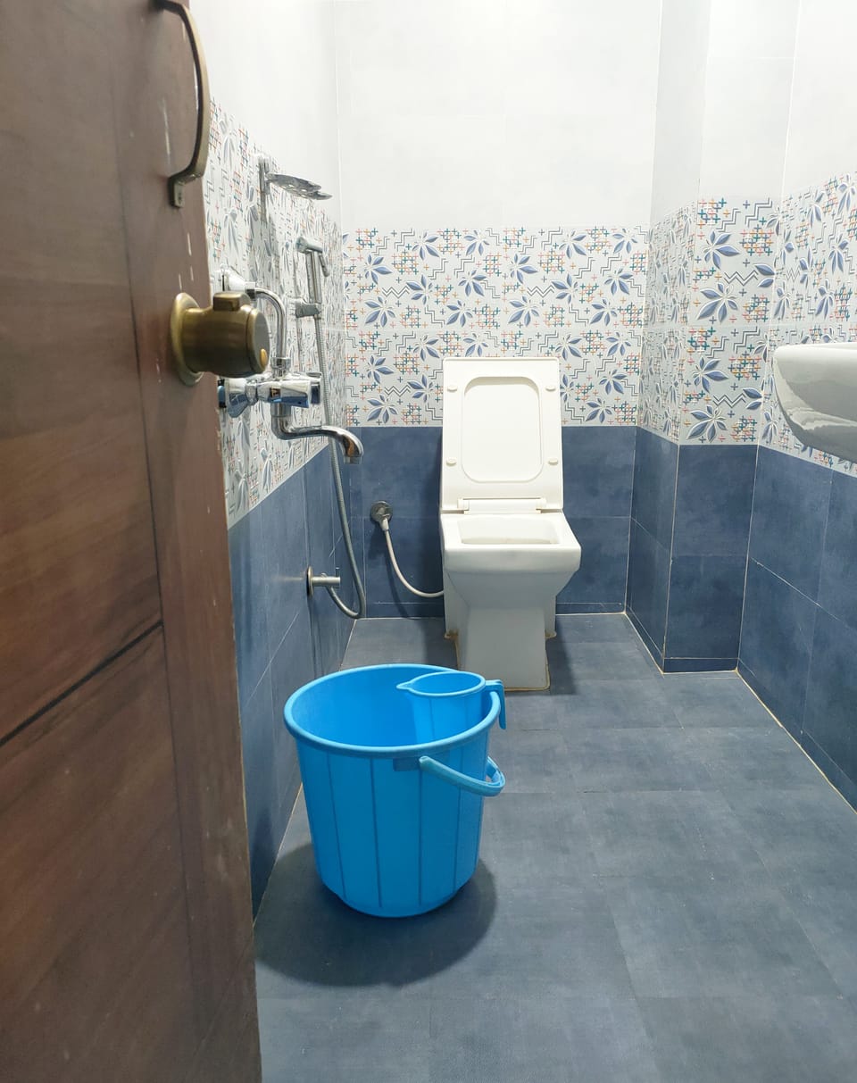 Shower, rainfall showerhead, towels