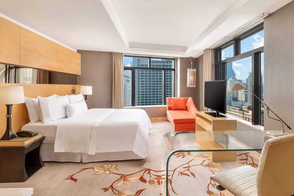 Room, 1 King Bed, City View | 1 bedroom, down comforters, minibar, in-room safe