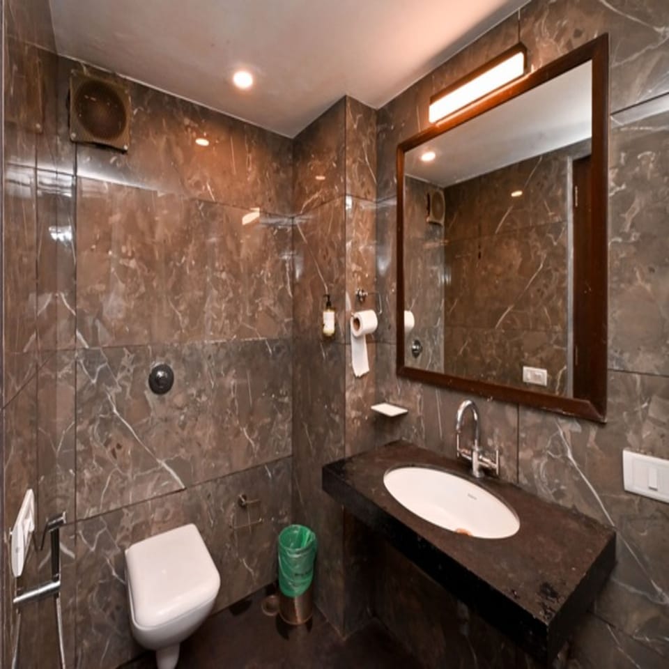 Shower, rainfall showerhead, towels, soap