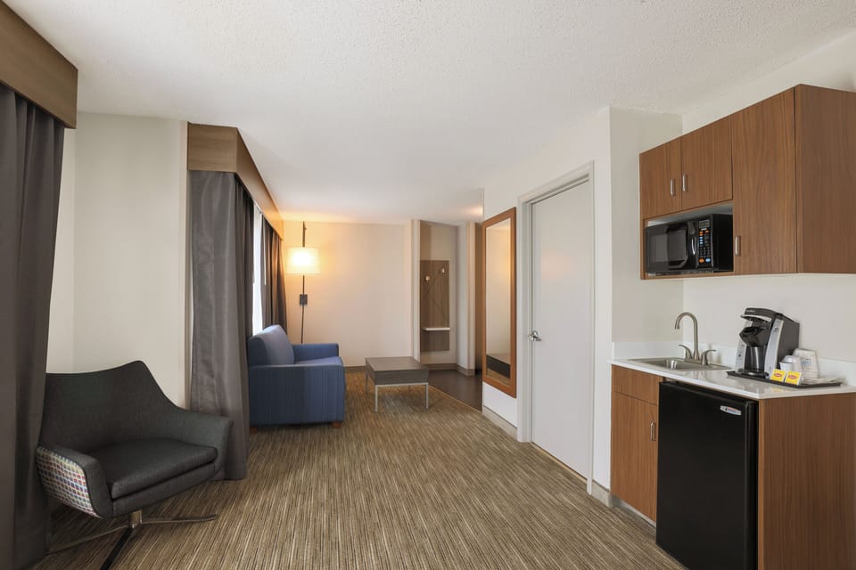 Suite, 2 Queen Beds (with Additional Living Area) | Premium bedding, down comforters, memory foam beds