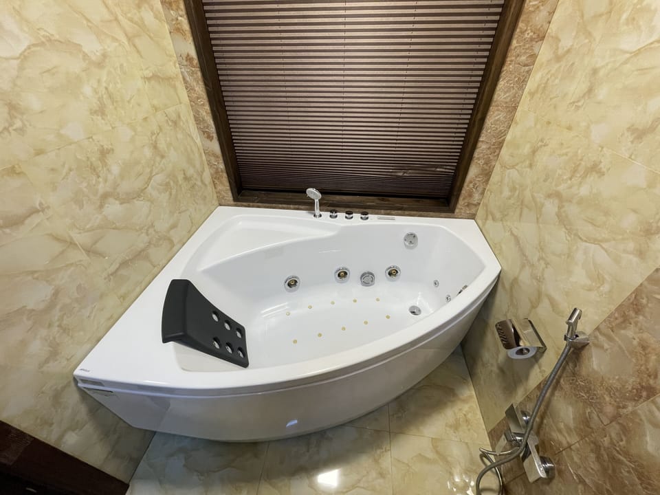 Luxury Double Room | Bathroom | Designer toiletries, hair dryer, bathrobes, slippers