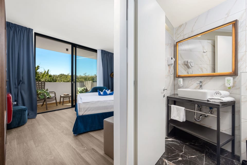 Standard Room, Balcony | In-room safe, desk, free cribs/infant beds, free WiFi
