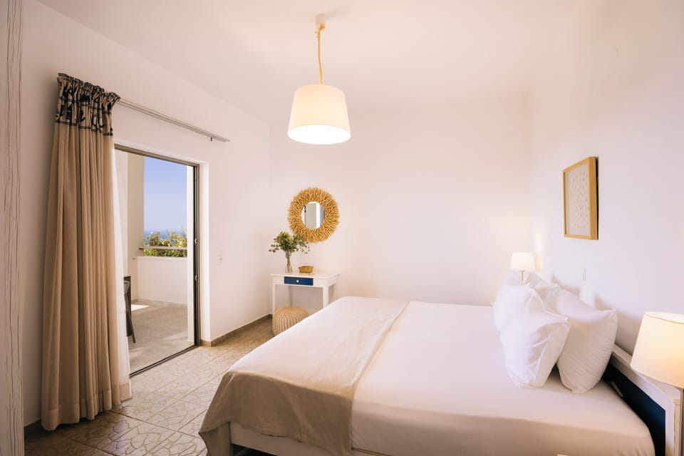 Suite, 1 Bedroom, Sea View | In-room safe, iron/ironing board, free WiFi, bed sheets