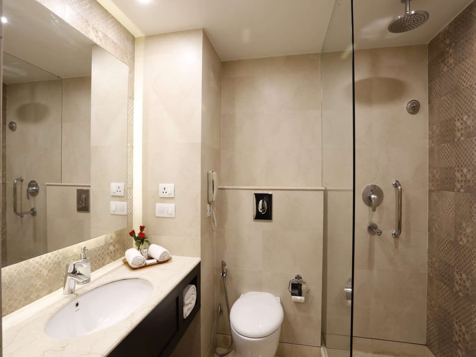 Shower, free toiletries, hair dryer, slippers