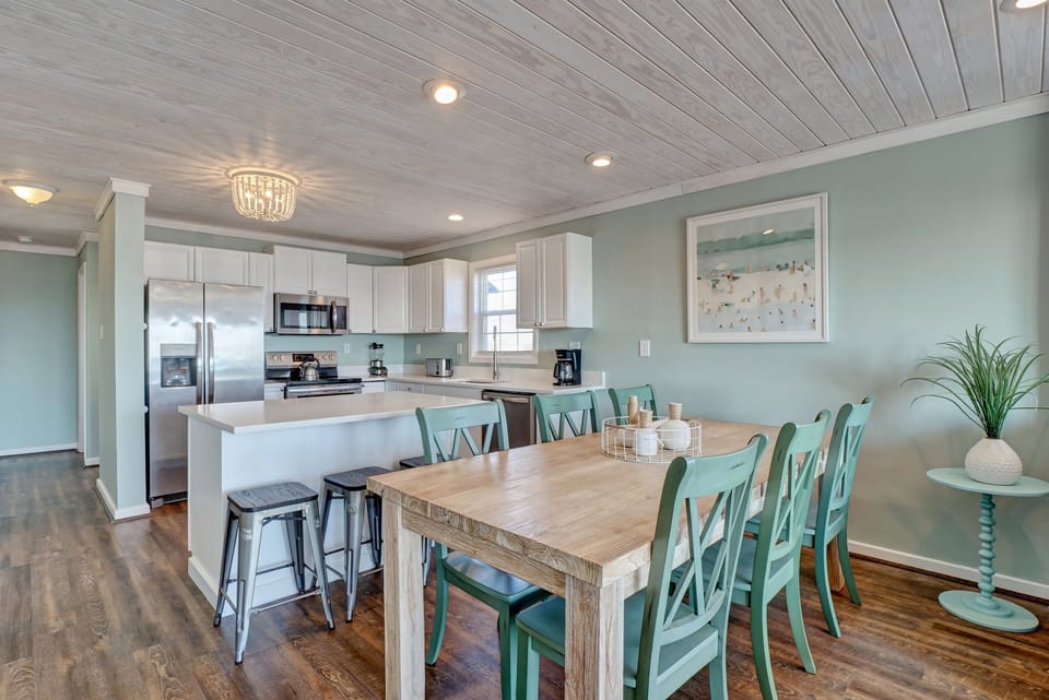 Seating for 3 at island and 6 at dining table