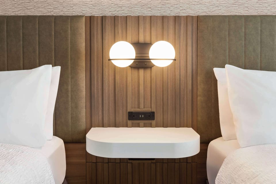 Blackout drapes, iron/ironing board, free rollaway beds, free WiFi