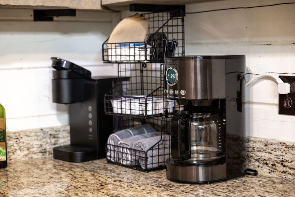 Coffee station with filters, creamer, sugar, Splenda & K cups.