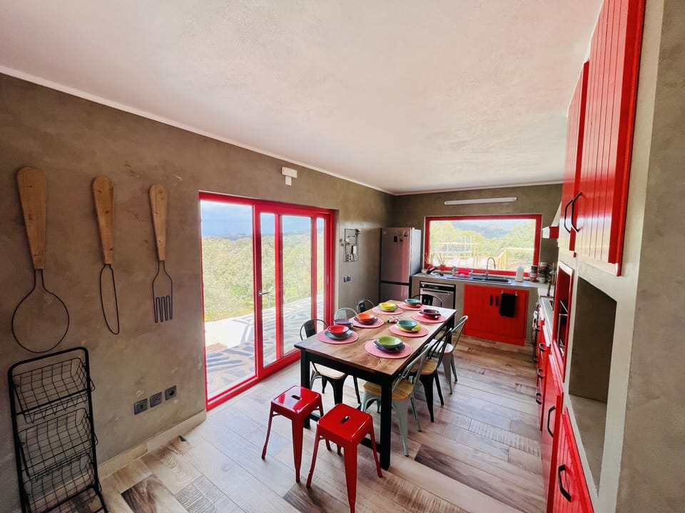 Fully equipped and comfortable kitchen, with access to pool and terrace.