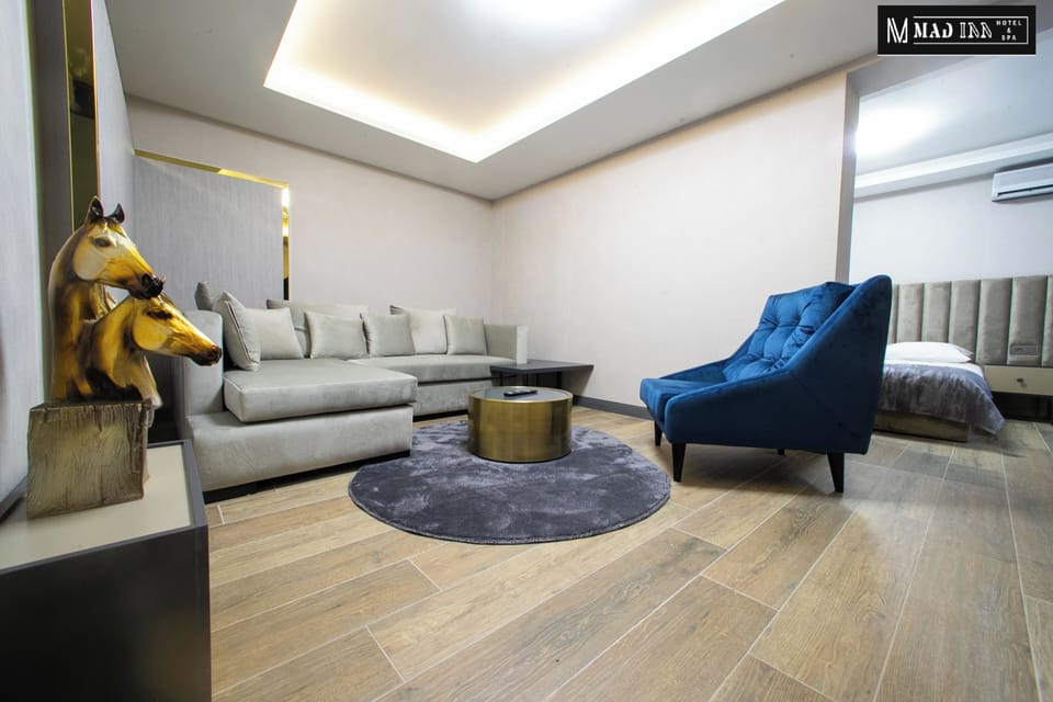 Family Suite | Minibar, blackout drapes, iron/ironing board (on request), WiFi (free)