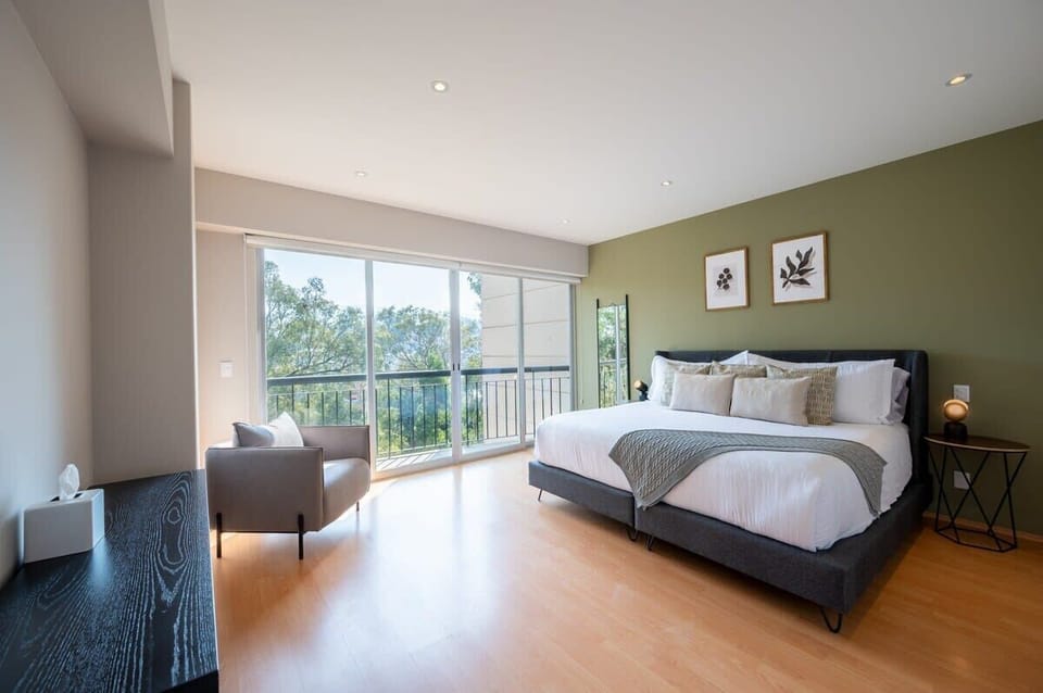 Relaxing bedroom with a balcony