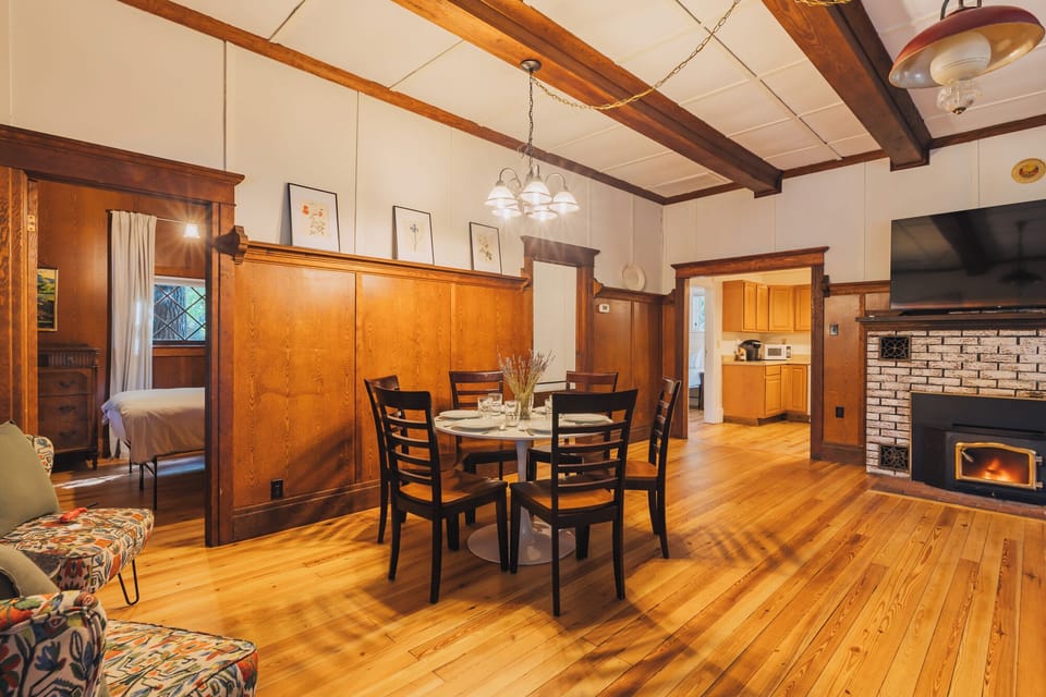 With soaring tall ceilings this room is open and spacious for eating or hanging out