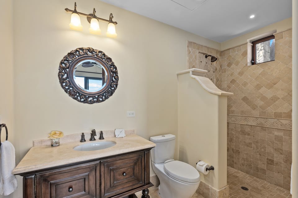 En suite bathroom with walk in shower