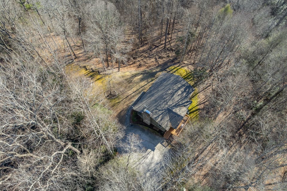 Upper drone view of where the cabin is nestled in the Blue Ridge Mountains