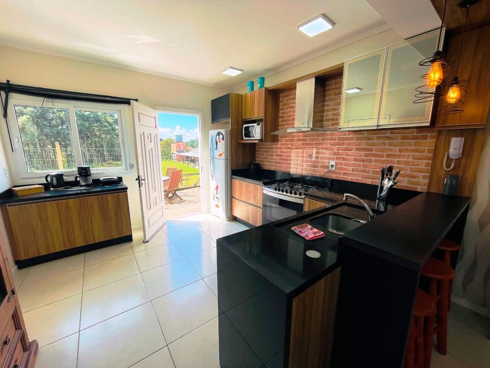 Basic Villa | Private kitchen | Fridge, microwave, blender, mixer
