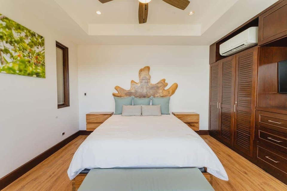 Master bedroom with fan and A/C