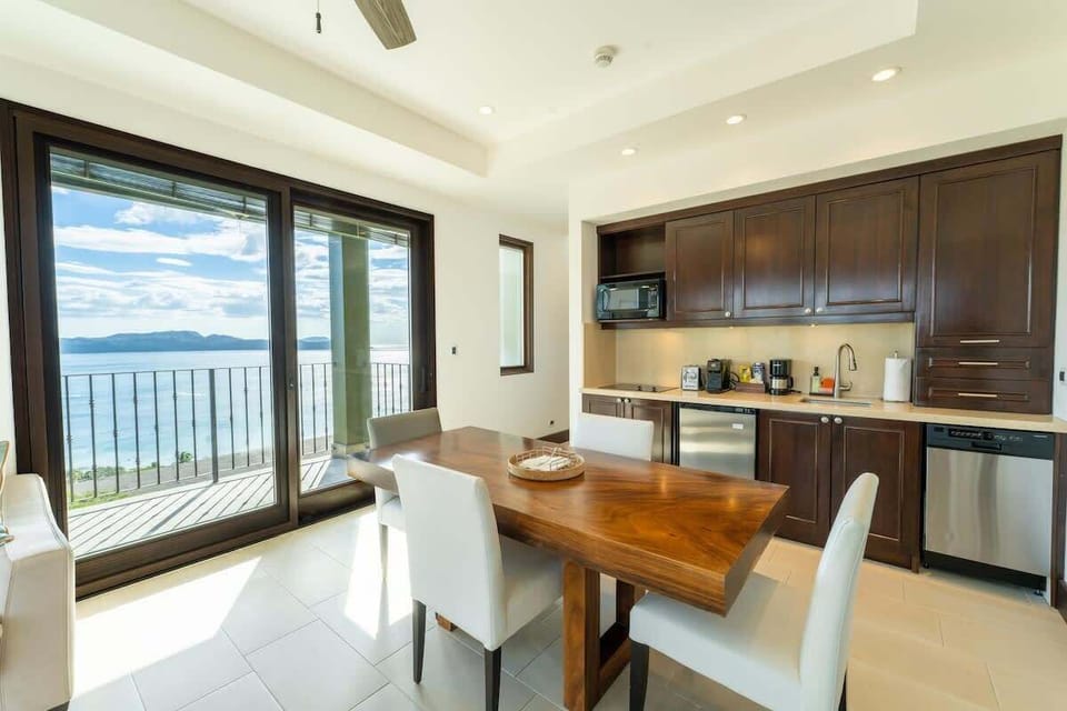 Open kitchen, stainless steel appliances, ocean views