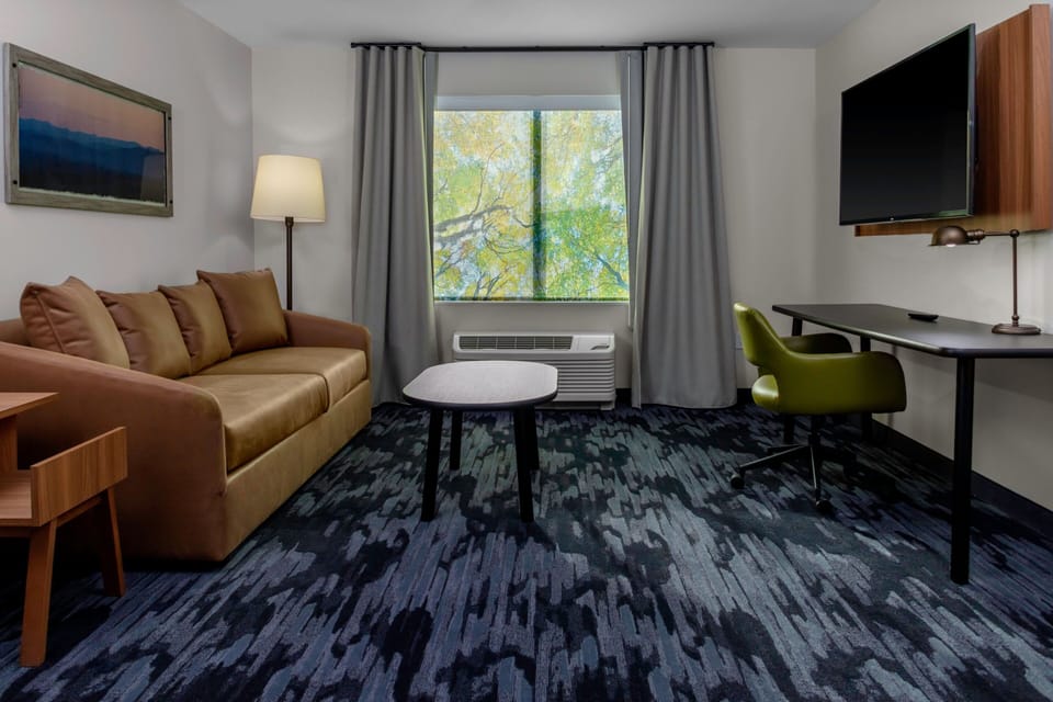 Premium bedding, pillowtop beds, desk, laptop workspace