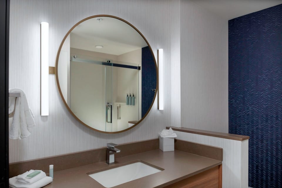 Combined shower/tub, hair dryer, towels, soap