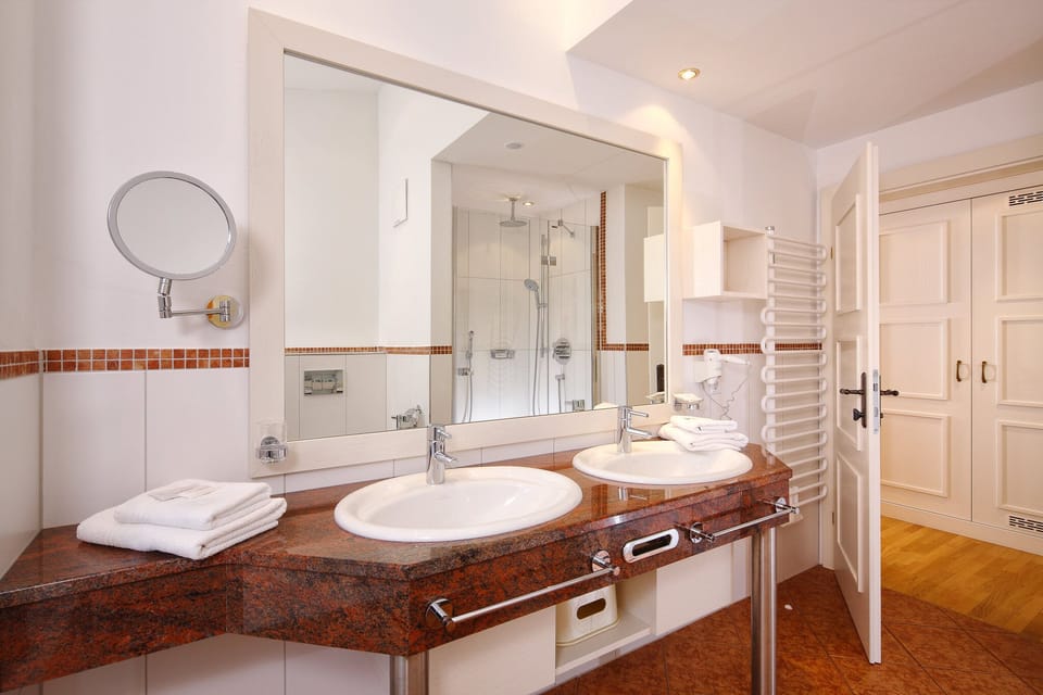 Hair dryer, heated floors, towels, soap