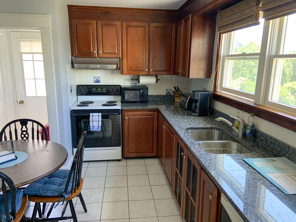 Kitchen- has microwave , toaster oven and coffee maker. 