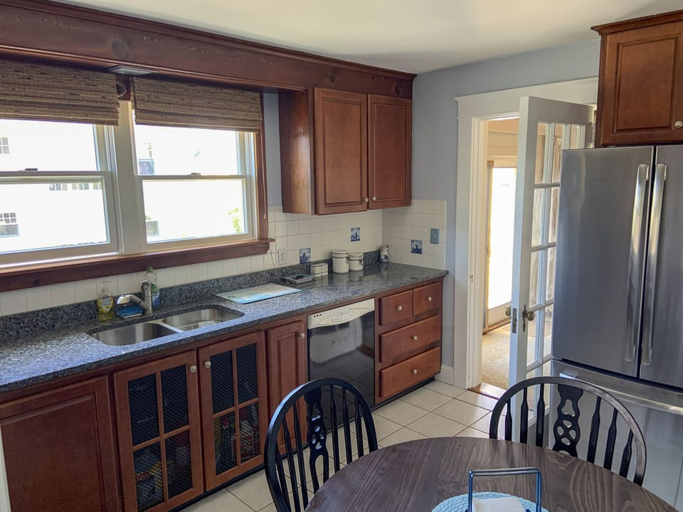 Kitchen showing dishwasher.