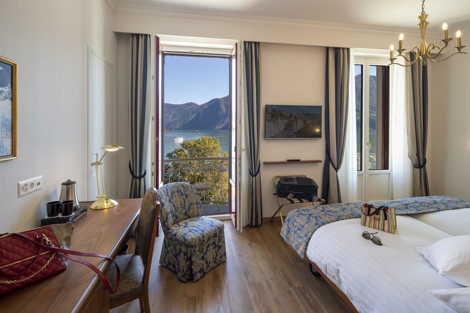 Panoramic Double Room, Balcony, Lake View | In-room safe, blackout drapes, free WiFi, bed sheets