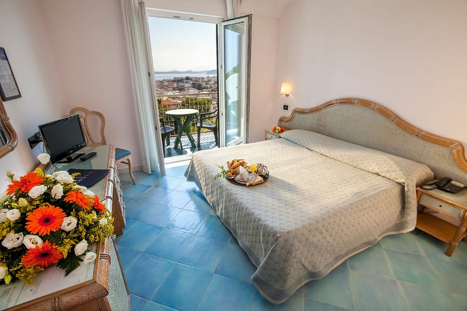 Superior Double Room, Balcony, Sea View | Minibar, desk, cribs/infant beds, free WiFi
