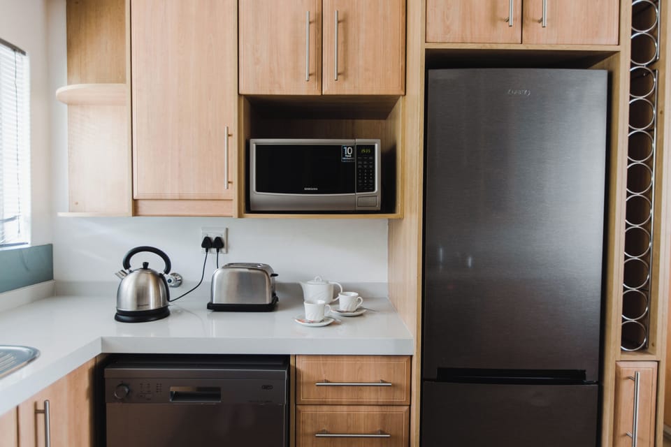 Superior Apartment, 3 Bedrooms, Non Smoking | Private kitchen | Full-size fridge, microwave, oven, stovetop